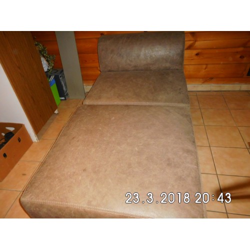 Lederen zetel + voetbank